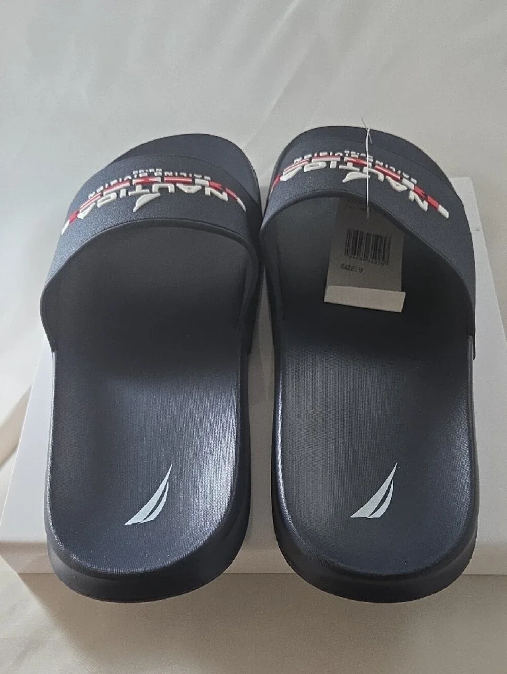 Nautica Black Slide Sandals with Red & White Sailing Division Logo